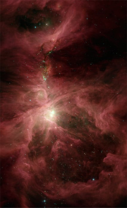 Imagem infravermelha da nebulosa de Orion, um local de quantidades maciças de formação de estrelas, obtida pelo Telescópio Espacial Spitzer da NASA. Crédito: NASA / JPL-Caltech / s.t. McGeady (Univ. De Toledo, OH). 
